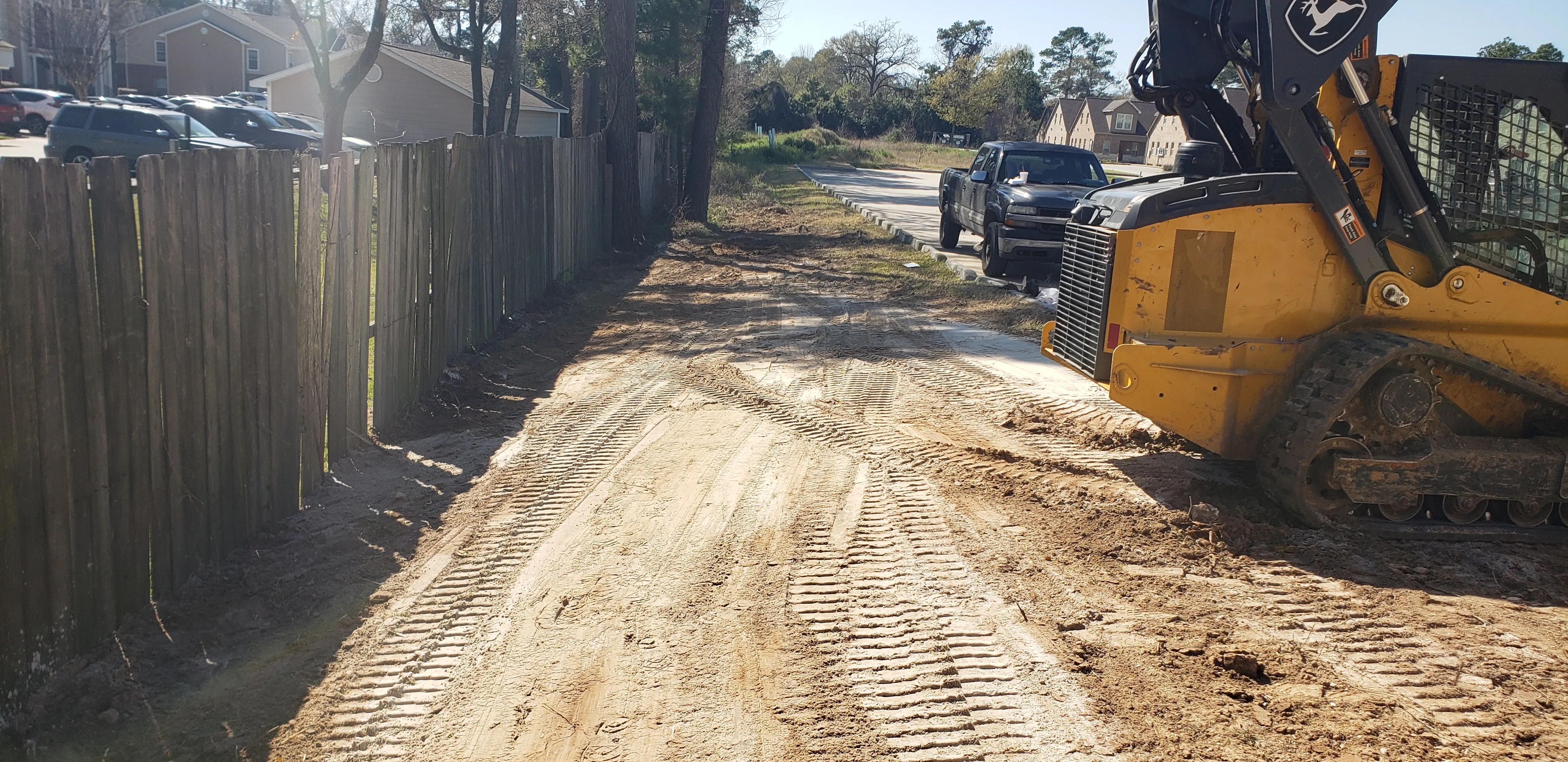 Flatten Land & Soil Removal project - Odie Tractor Services Houston TX